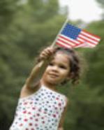 Child waving USA flag